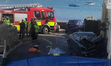 Anglesey: Three people killed as car 'hits pedestrian and house' .